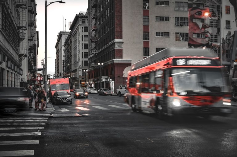 a bus travels down the street